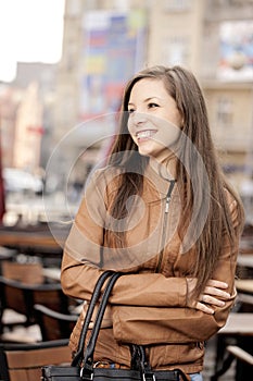 Woman smiling on the street