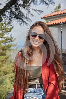 Woman smiling in summer sunshine