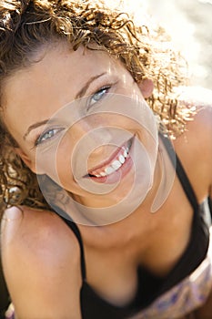 Woman smiling at viewer.