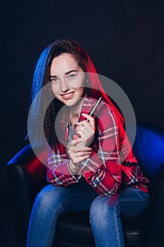 Woman smoking electronic cigarette with smoke