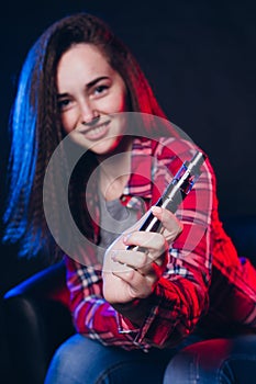 Woman smoking electronic cigarette with smoke