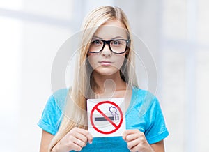 Woman with smoking restriction sign