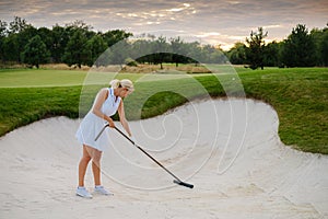 Woman Smooth Sand For Better Ball Hit .