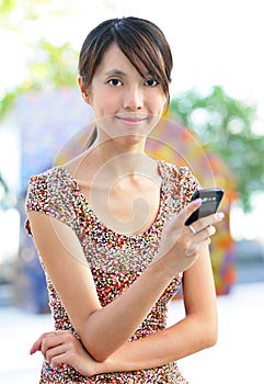 Woman sms on cell phone