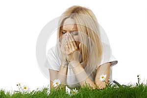 Woman sneezing of spring allergy