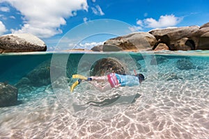 Woman snorkeling in tropical water