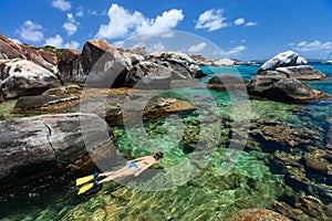 Woman snorkeling at tropical water