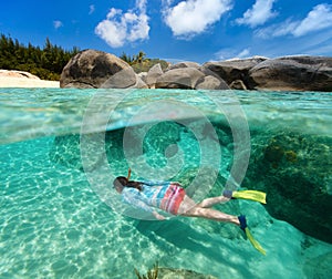 Woman snorkeling in tropical water