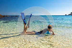 Woman snorkeling in tropical water