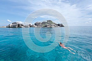 Woman snorkling at Similan Island .Andaman sea in Thailand