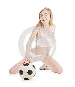 woman with soccer ball over white