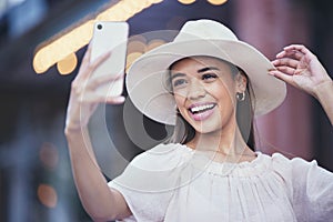 Woman, social media and smile for selfie in the city for vlogging, travel or profile picture and memories. Happy female