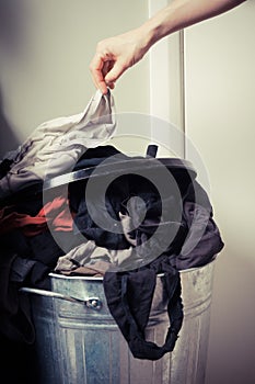 Woman sorting out her laundry