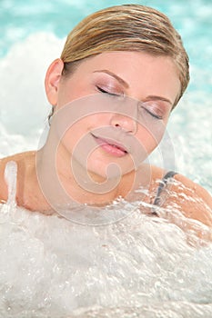 Woman in spa bath