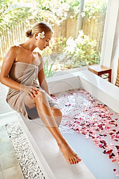Woman Spa Body Care Treatment. Flower Rose Bath. Beauty, Skincare