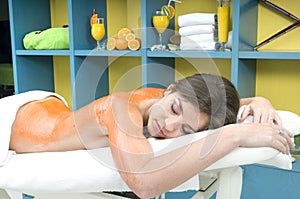 Woman in a spa getting massage