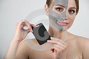 Woman spa mask half-face beauty concept healthy portrait