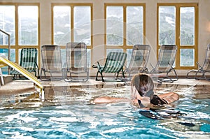 Woman in spa pool