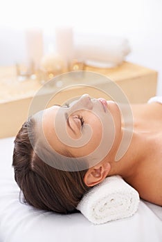 Woman, spa and relax for wellness and face, self care with aromatherapy or alternative medicine for peace and calm