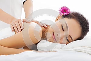 woman in spa salon getting massage