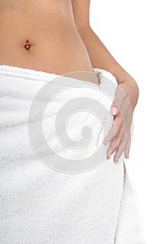 Woman with spa towel around waist