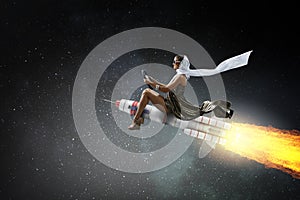 Woman on space rocket . Mixed media