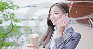 Woman speak on phone happily