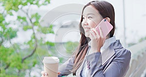 Woman speak on phone happily