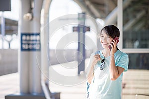 Woman speak on phone happily