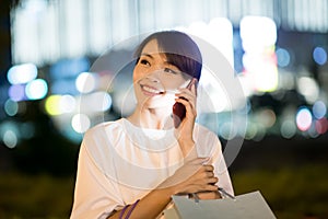 Woman speak phone happily