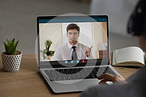 Woman speak on video call on computer with boss