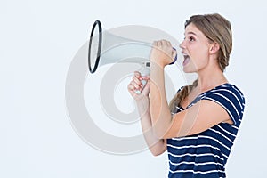 Woman speaking through a loudspeaker
