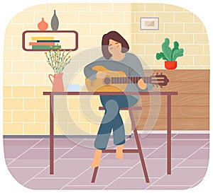 Woman spending time at home. Guitarist with acoustic instrument. Girl plays guitar and creates music