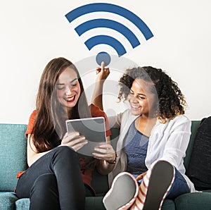 Woman spending time together on the couch