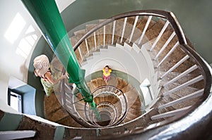 Woman on Spiral stairs