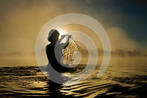 Woman splashing in water