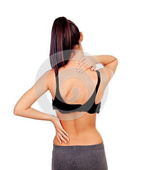 Woman in sport clothes with back pain
