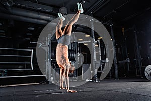 Woman in sportswear doing crossfit workout