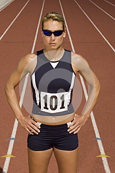 Woman In Sportswear On Racetrack