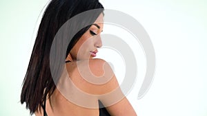 woman in sportswear spinning and moving seductively in the studio