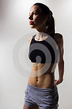 Woman in sportswear on a white background. Yoga.