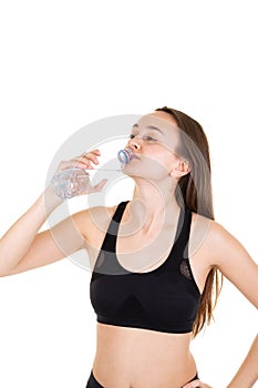 Woman sporty fitness drinking bottle of water