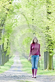 Woman in spring alley