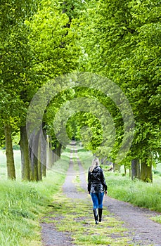 Woman in spring alley