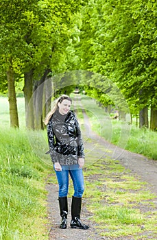 Woman in spring alley