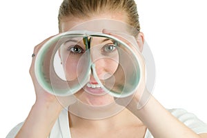 Woman spying through double roll of paper