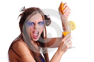 Woman squeeze a orange