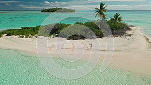 Woman stack on wild uninhabited island in sea