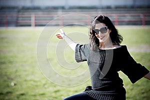 Woman on the stadium wearing black