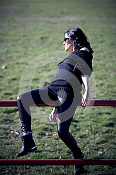 Woman on the stadium wearing black